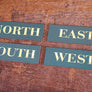 Four Directions Wall Signs